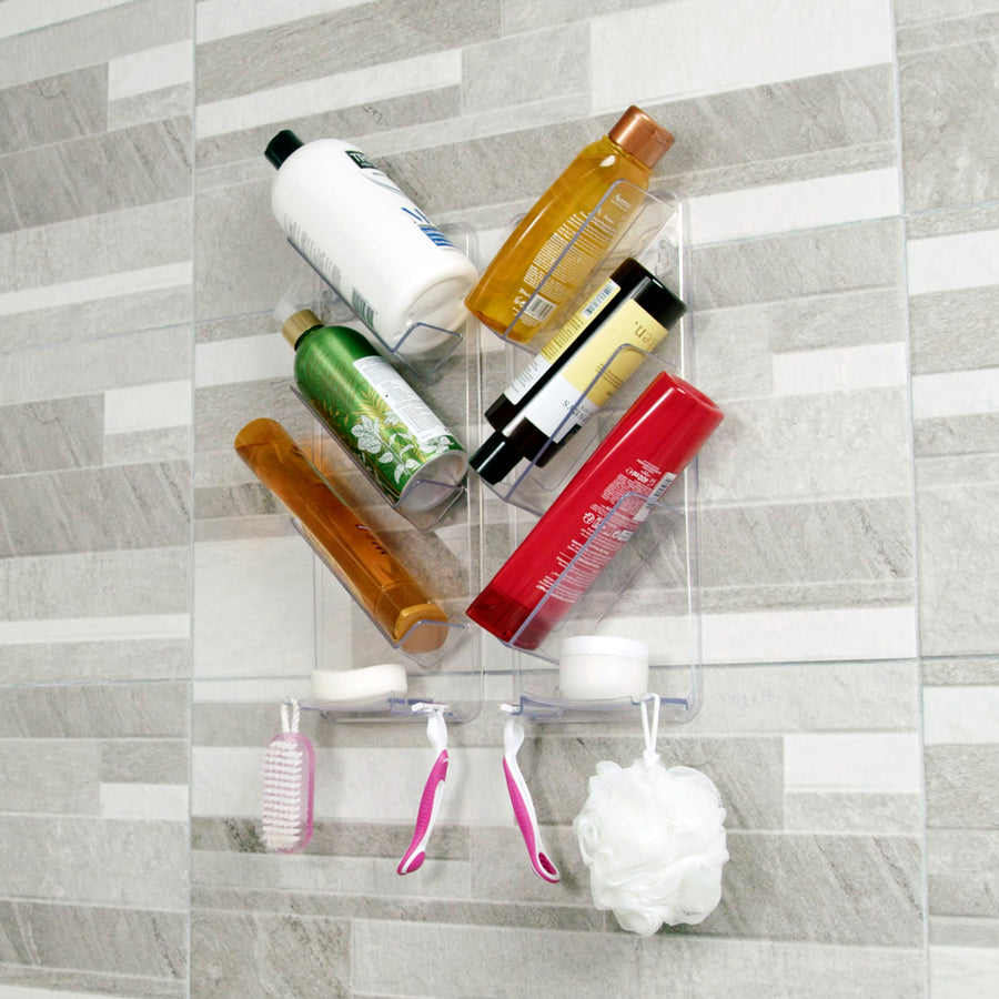 ShowerGem clear plastic shower caddy holding bottles, razors and a sponge on a tiled shower wall